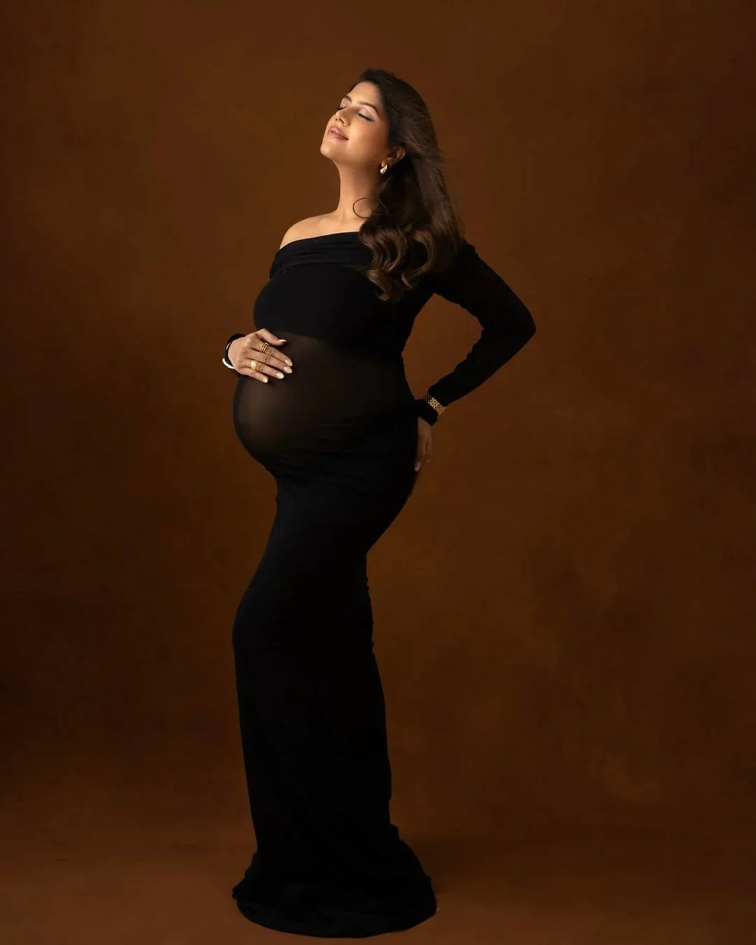 Tiffany Mesh Bodycon Gown by FlairNFrillz, elegant maternity dress featuring a fitted mesh design, perfect for special occasions.