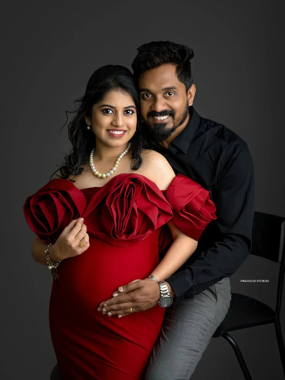 Johanna Maroon Maternity Gown by FlairNFrillz featuring flowing fabric and elegant design for expecting mothers.