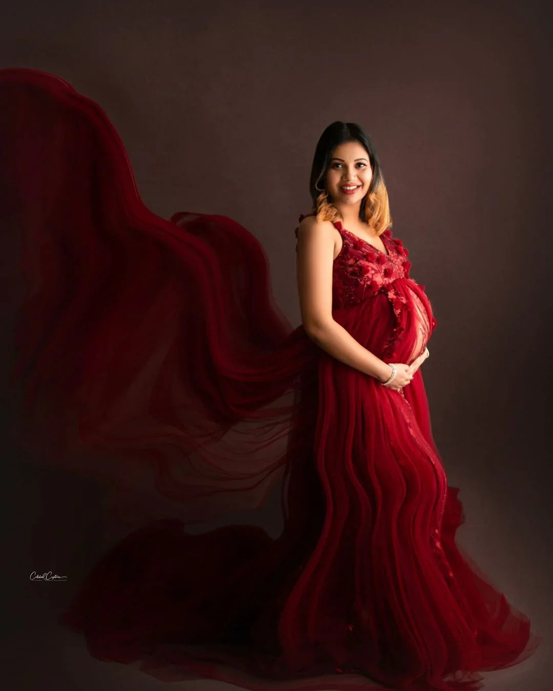 Maroon maternity gown by FlairNFrillz featuring a flowing design and elegant fit, perfect for expecting mothers.